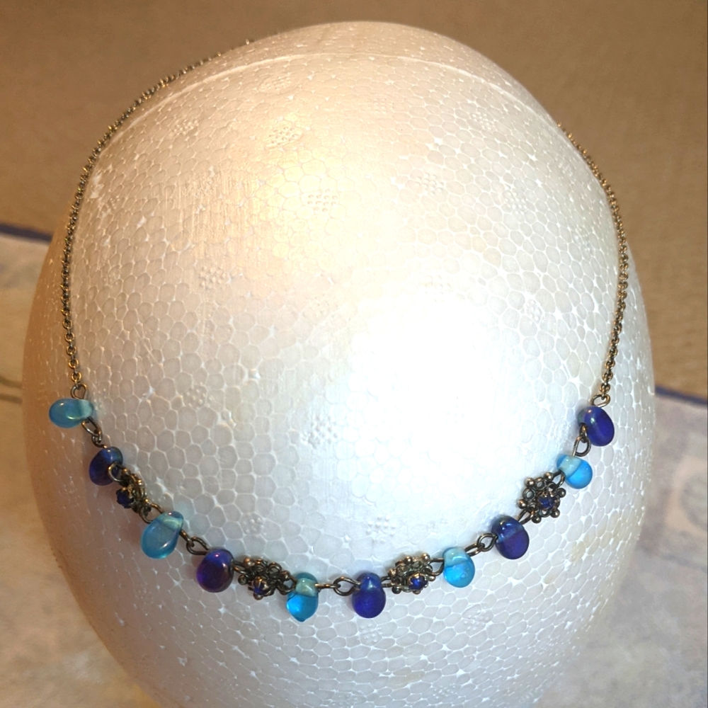 Pretty blue glass necklace.